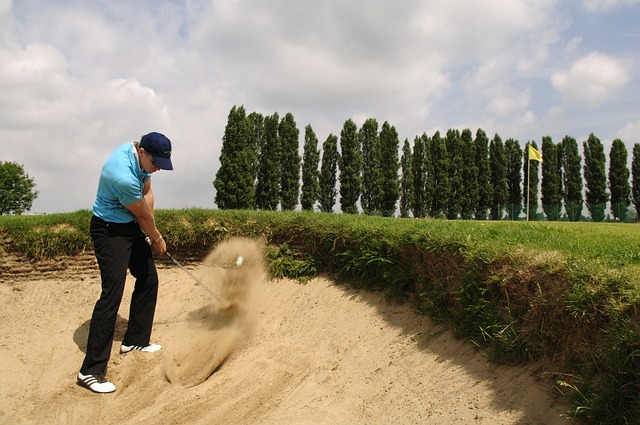 Hampton Golf Course Image of Golfer in a dand trap