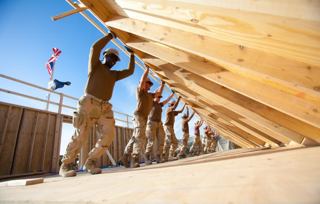 Recommended Home Resources Main Image of constructions workers lifting a wall